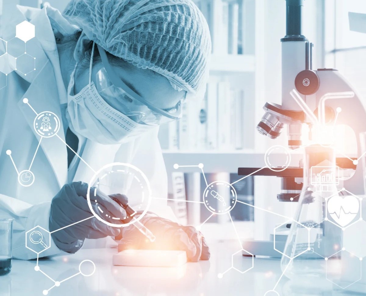 Lab specialist working with microscope